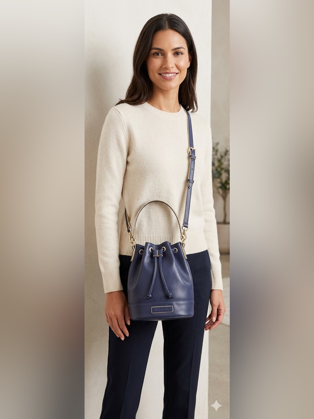 Vera Bradley NWOT Vegan leather Navy
Bucket/crossbody bag w/ 
Silver Hardware